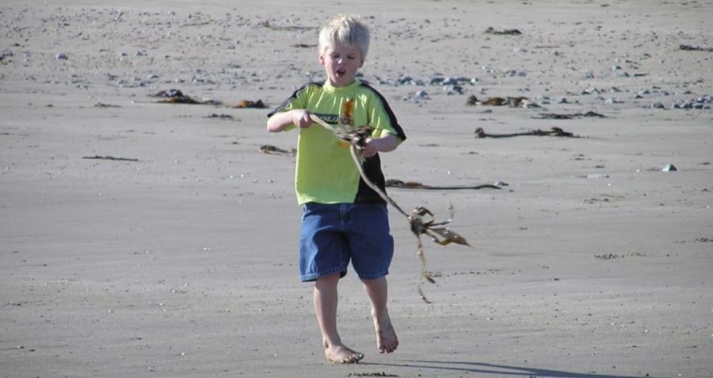 young-blonde-boy-on-beach